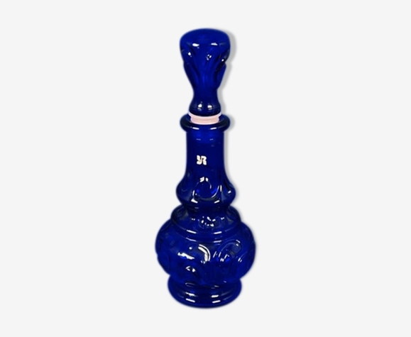 Dark blue glass bottle