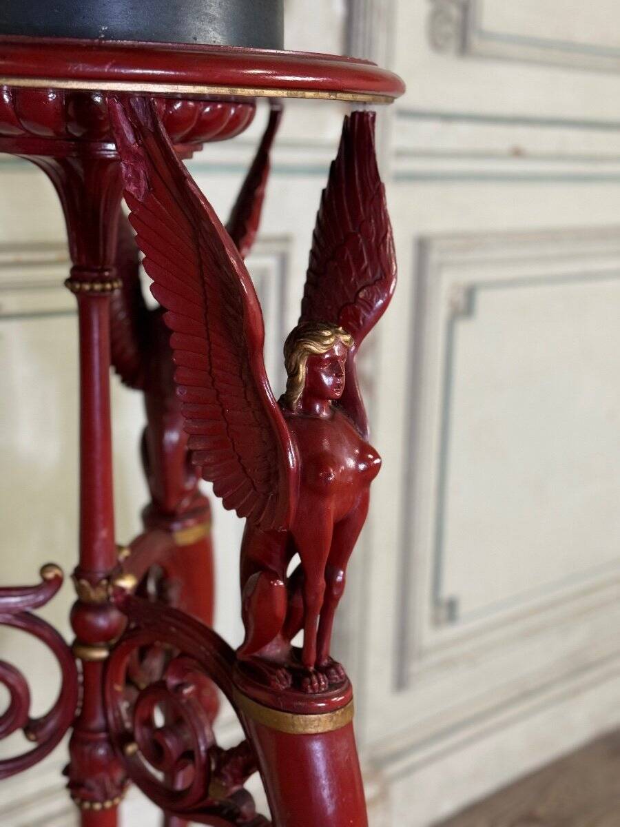 Athenian carved wood, red patina imitation of red marble