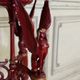 Athenian carved wood, red patina imitation of red marble