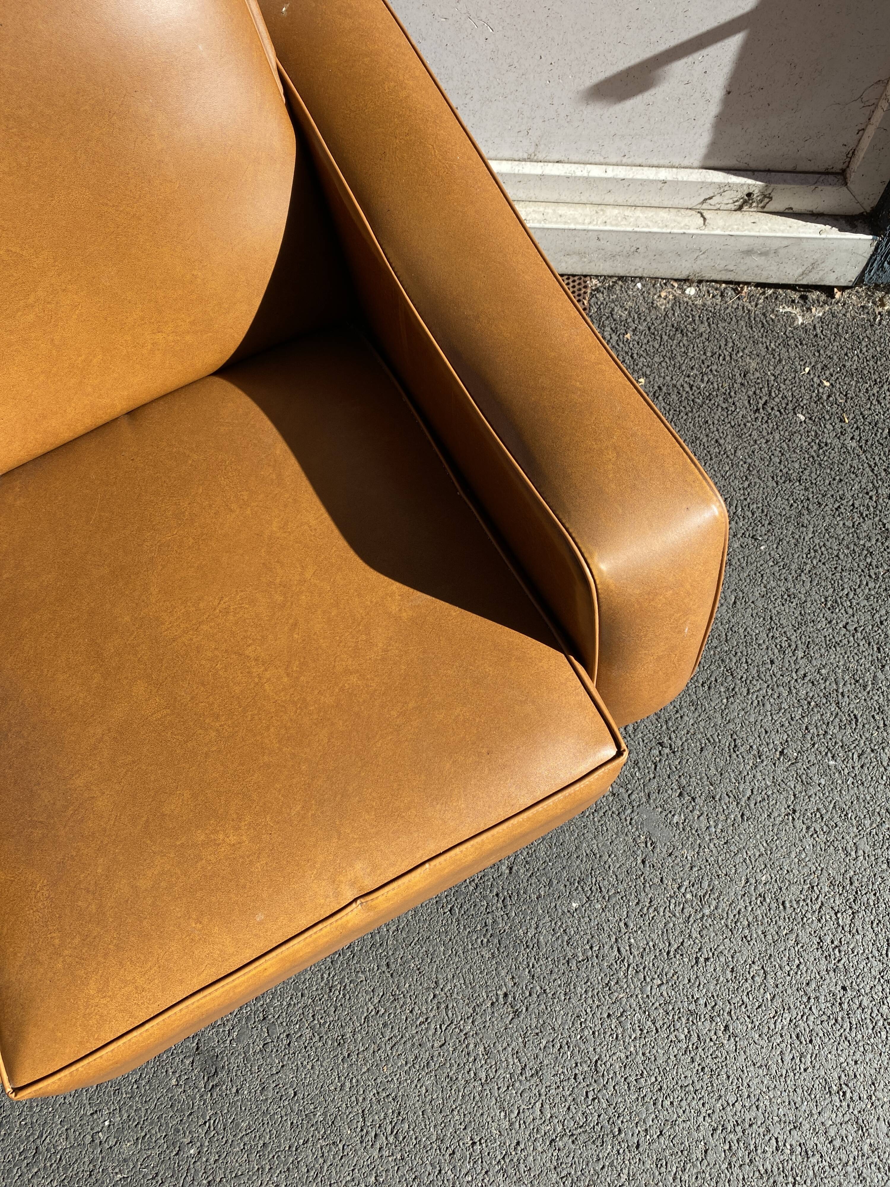 Vintage armchair imitation brown leather
