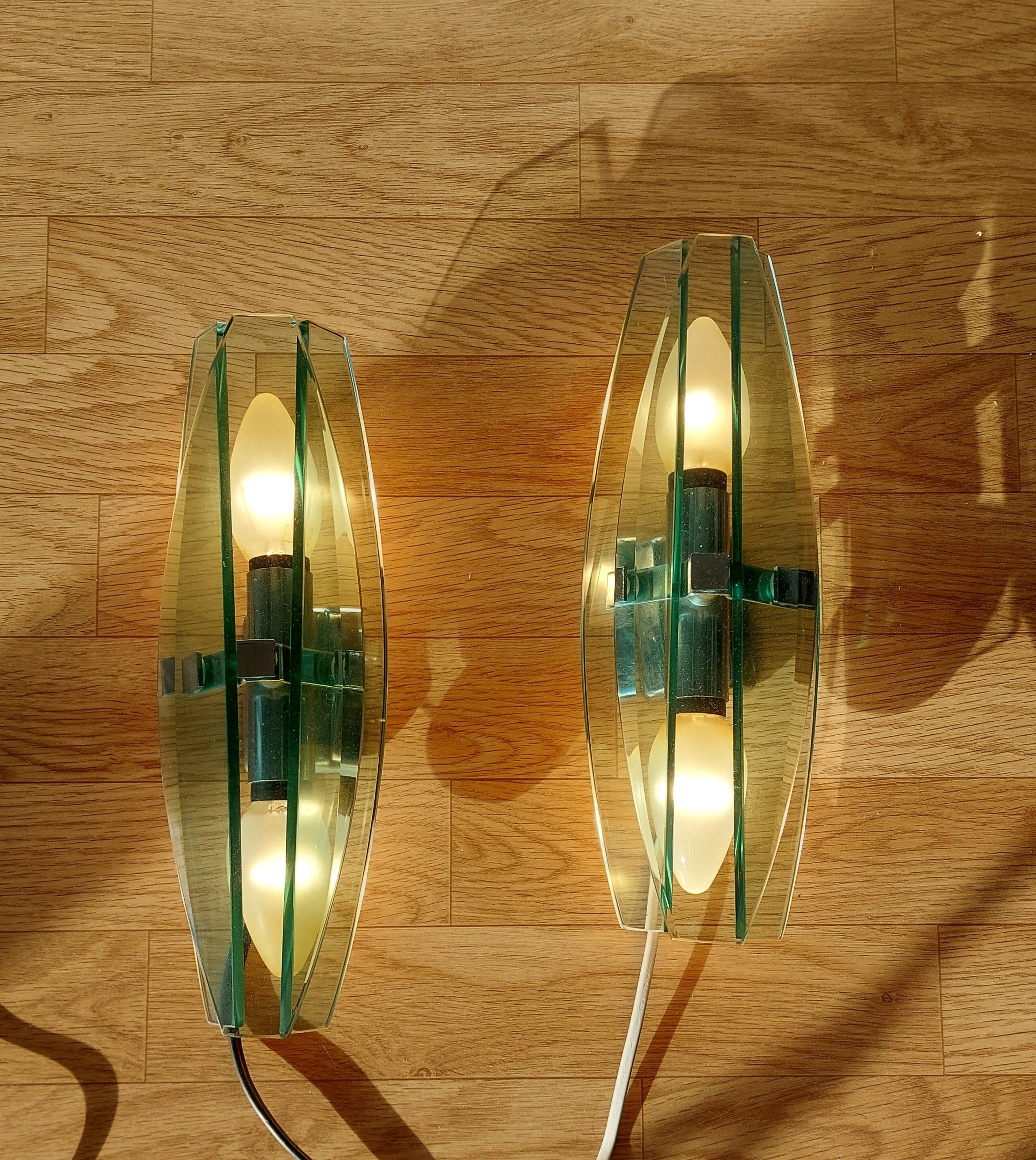 Pair of Veca wall lamps in blue/green tinted glass 1970