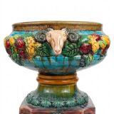 Large neoclassical majolica jardinière with ram's heads.