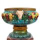 Large neoclassical majolica jardinière with ram's heads.