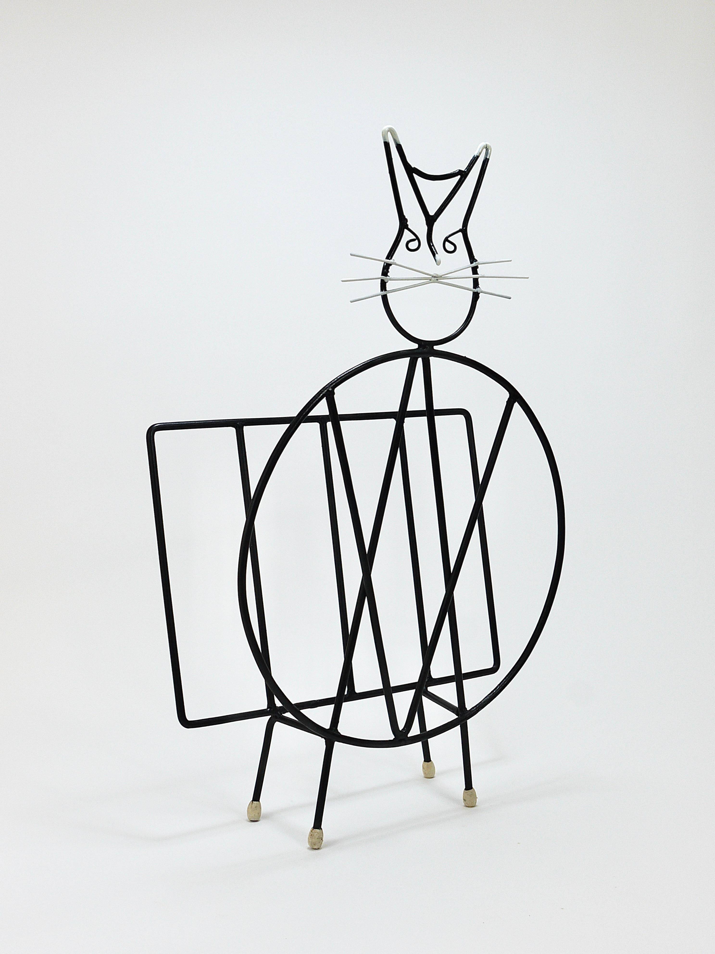 Mid-century cat-shaped magazine or record holder, iron, Italy, 1950s.