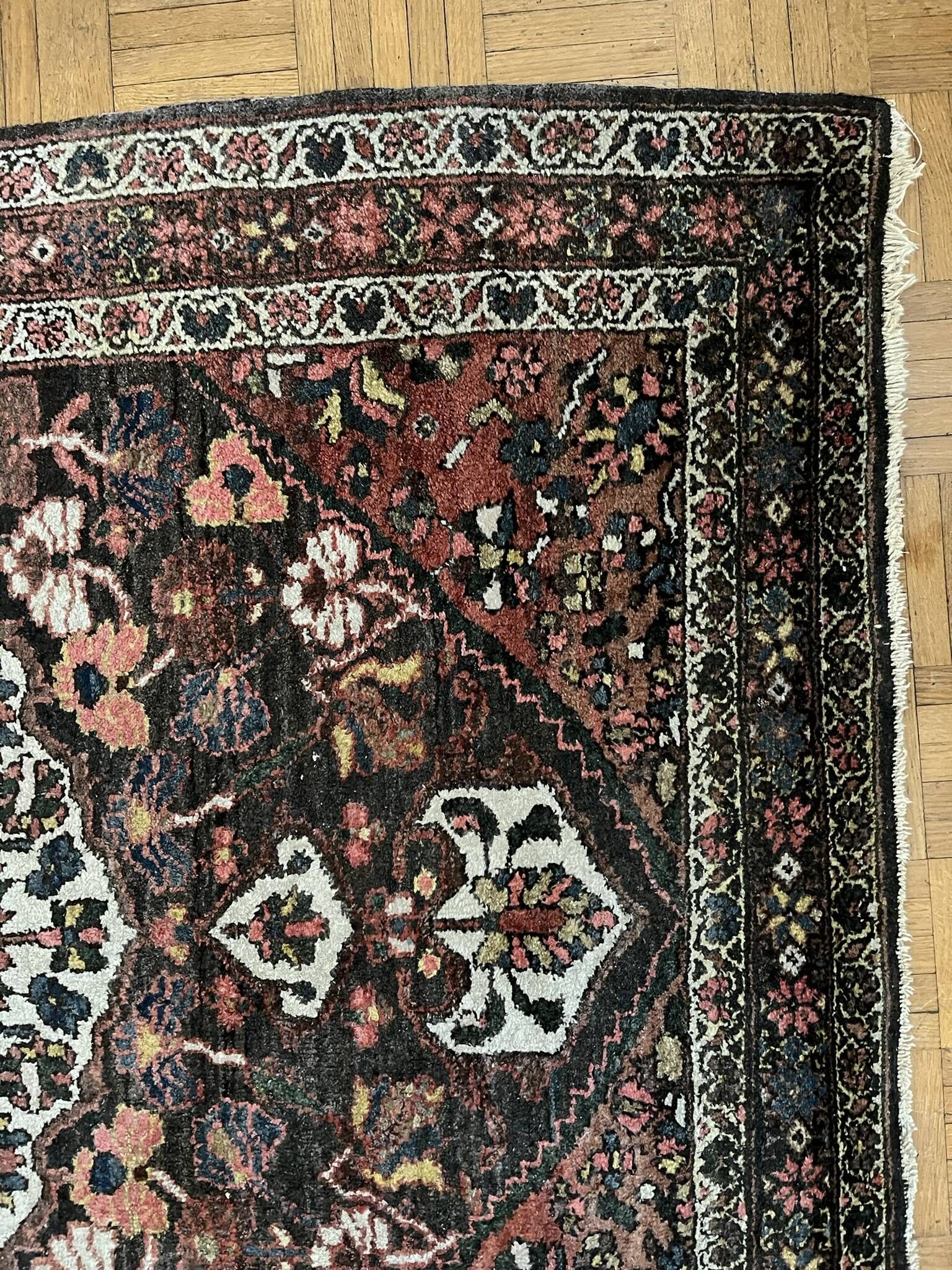 Antique handmade Hamadan Persian rug, ivory medallion on dark background 148x103.