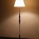 Vintage 1960s Scandinavian style floor lamp in teak and brass.