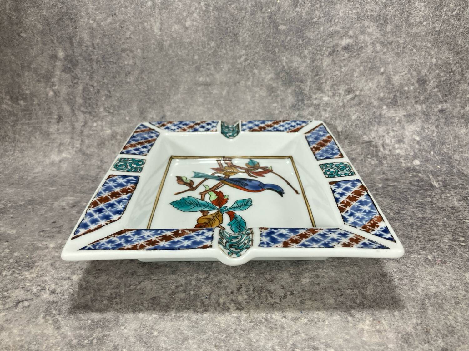 Ashtray. Trinket dish. Japanese porcelain. Blue bird on an autumn branch