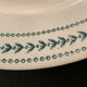 8 flat plates in opaque porcelain from Gien Terre de Fer, model Lauriers, XXth