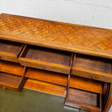 Cylinder desk with marquetry featuring a crosshatch design.