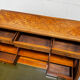 Cylinder desk with marquetry featuring a crosshatch design.