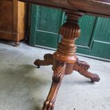Round pedestal table with marble top and mahogany tripod from the 19th century