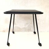 Black table on wheels from the 60s