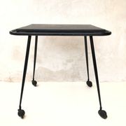 Black table on wheels from the 60s