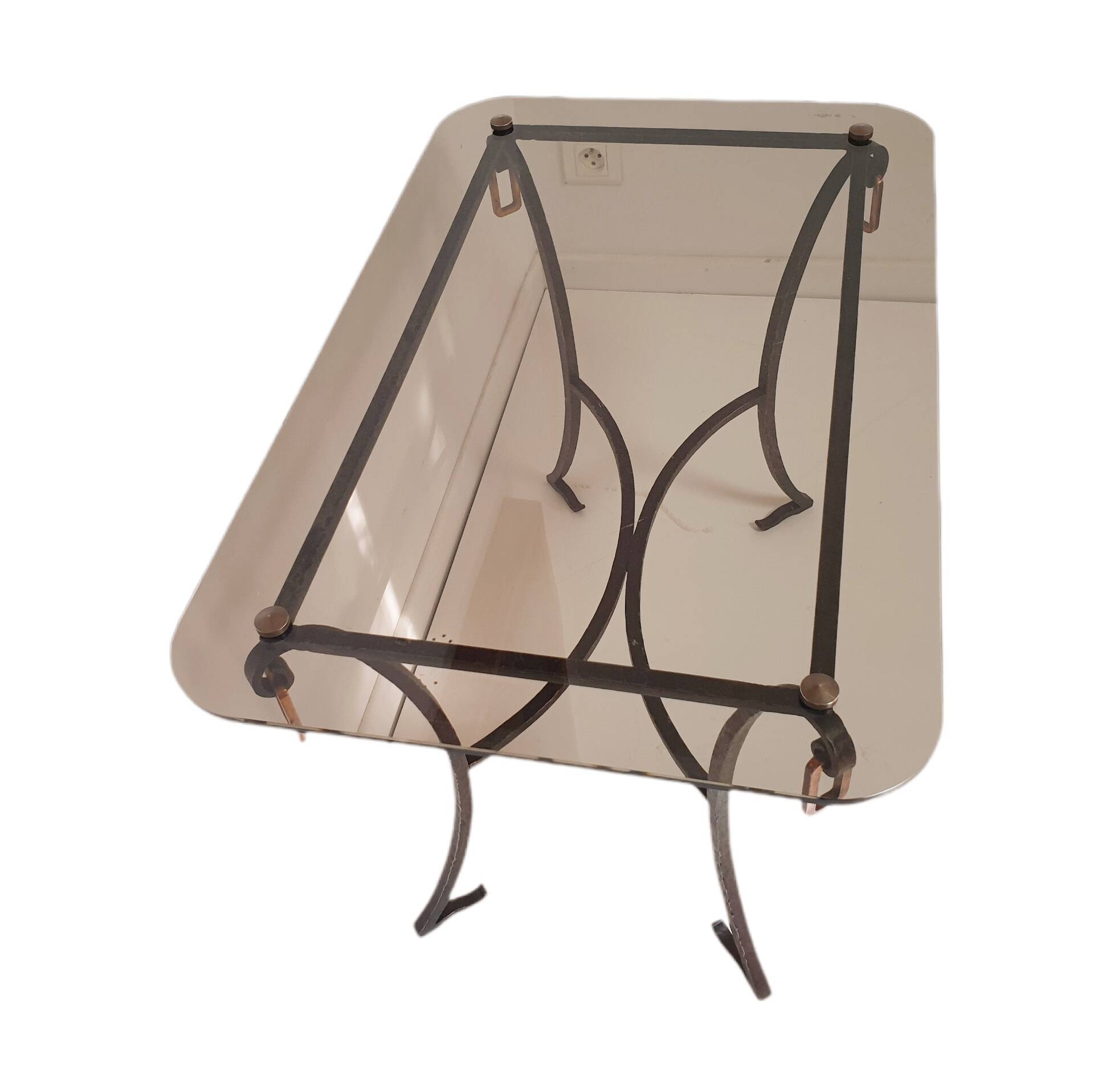 1960s/70s coffee table in wrought iron and smoked glass.