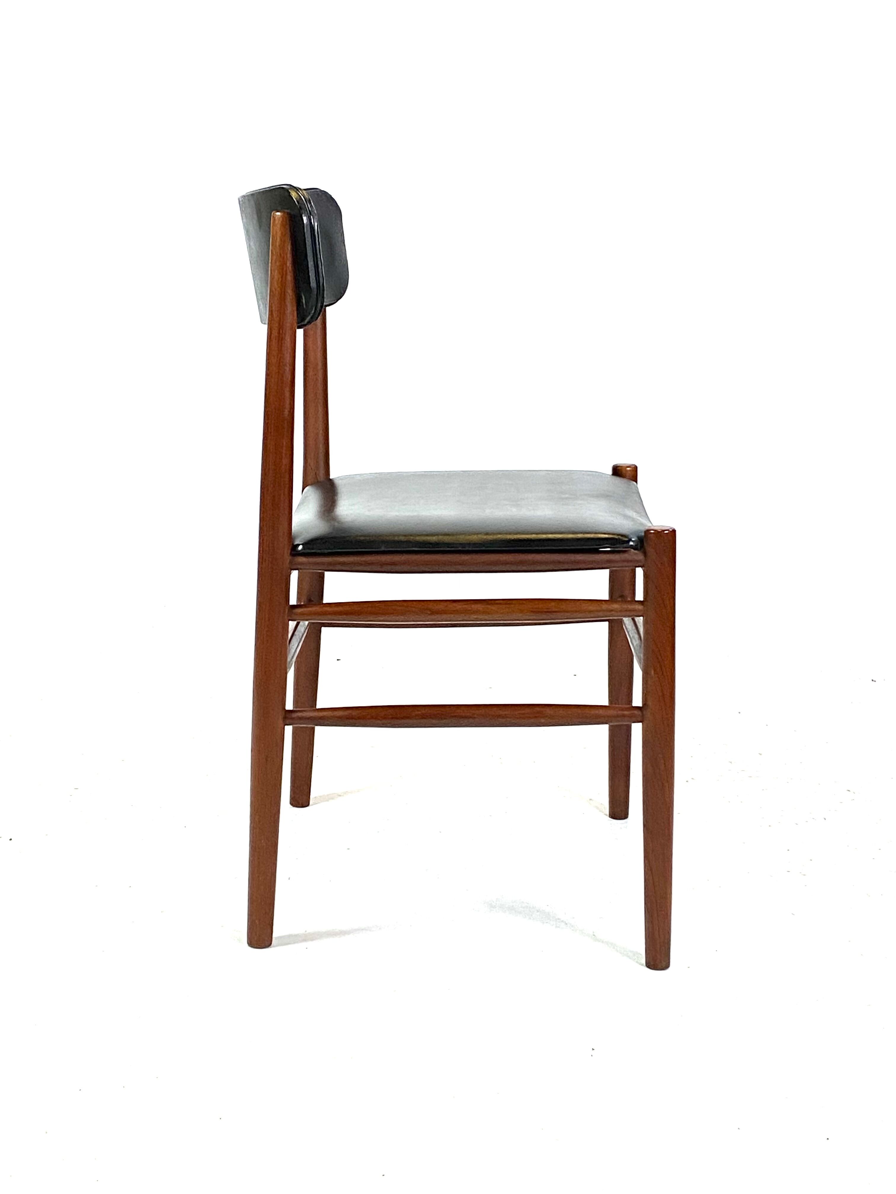 Two dining room chairs in teak and upholstered with black leather of Danish design, 1960s