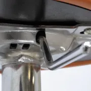 Adjustable orange swivel bar stool