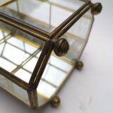 Vintage showcase in brass, glass and mirrors