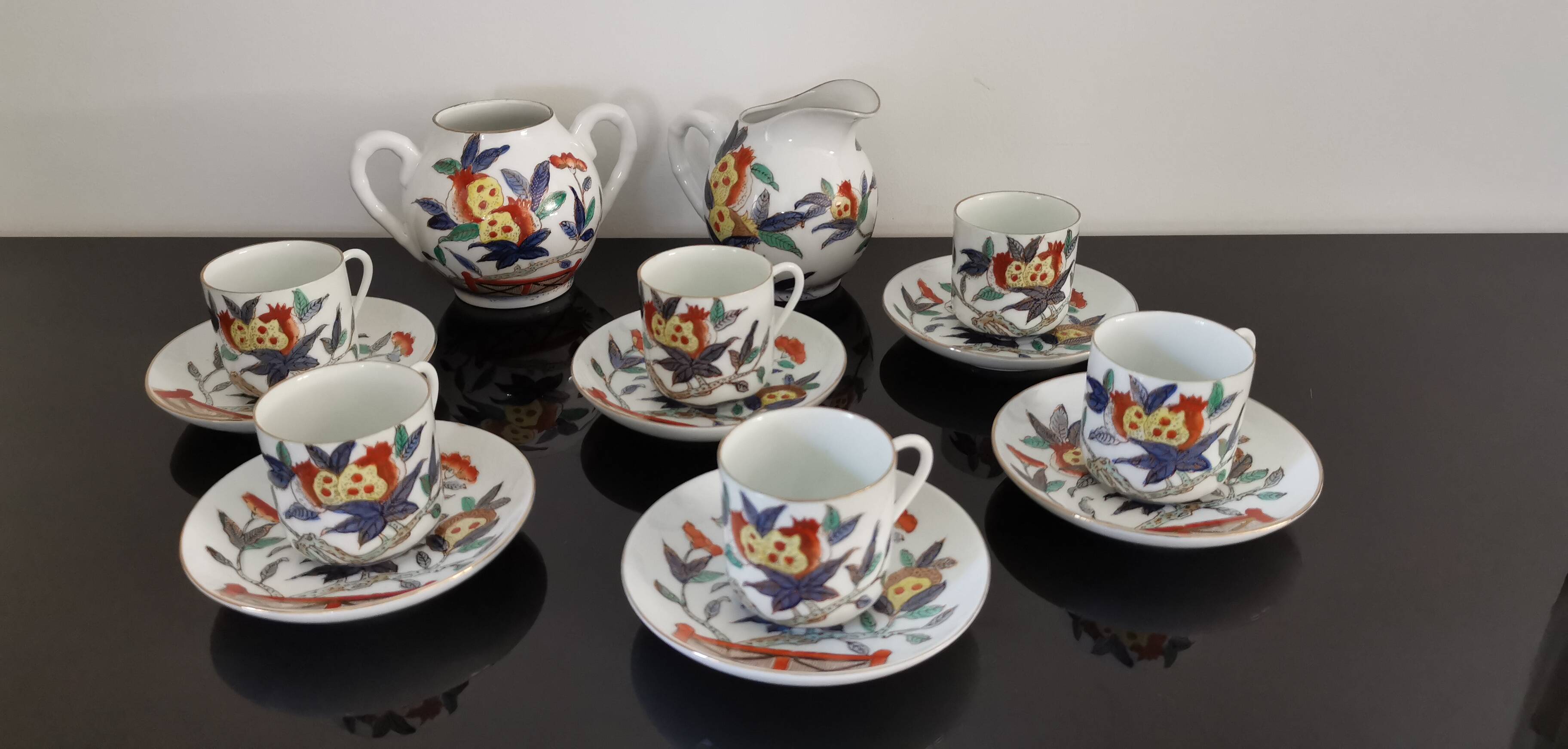 Set of 6 porcelain cups, 6 saucers, teapot and milk jug