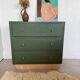 Vintage olive green chest of drawers with striped base