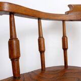 Elm armchair with curved back