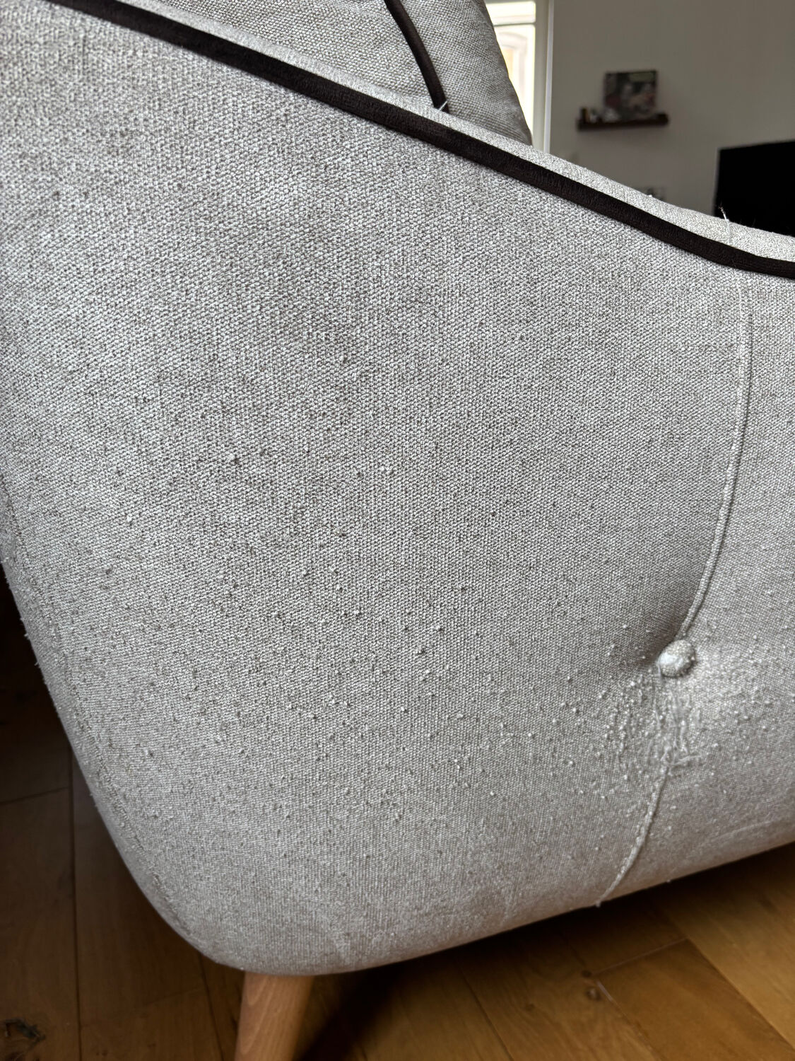 Grey two-seater sofa