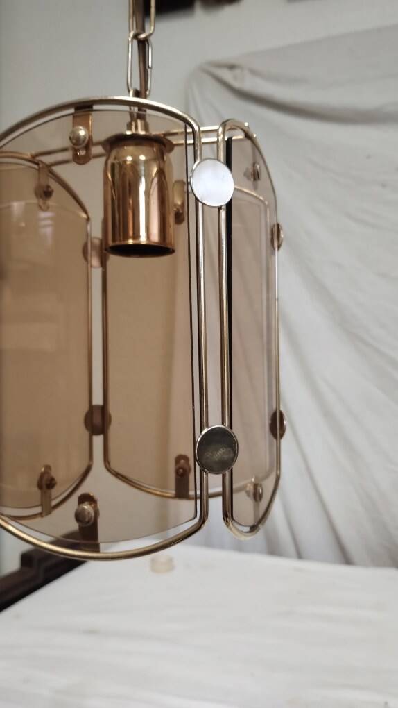 Suspension in gold metal and smoked glass