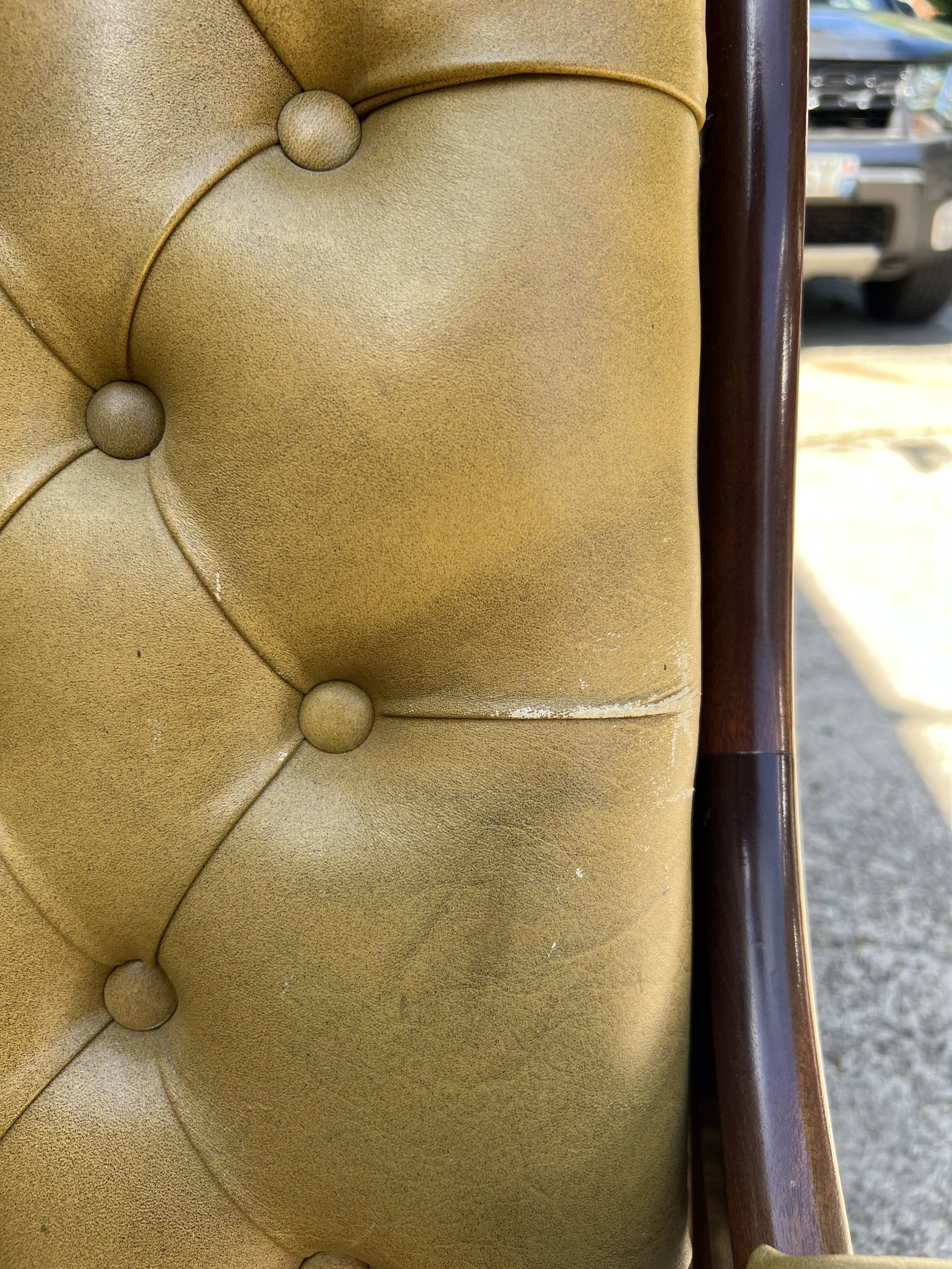 Victoria style green leather chesterfield armchair