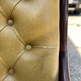 Victoria style green leather chesterfield armchair