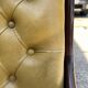 Victoria style green leather chesterfield armchair