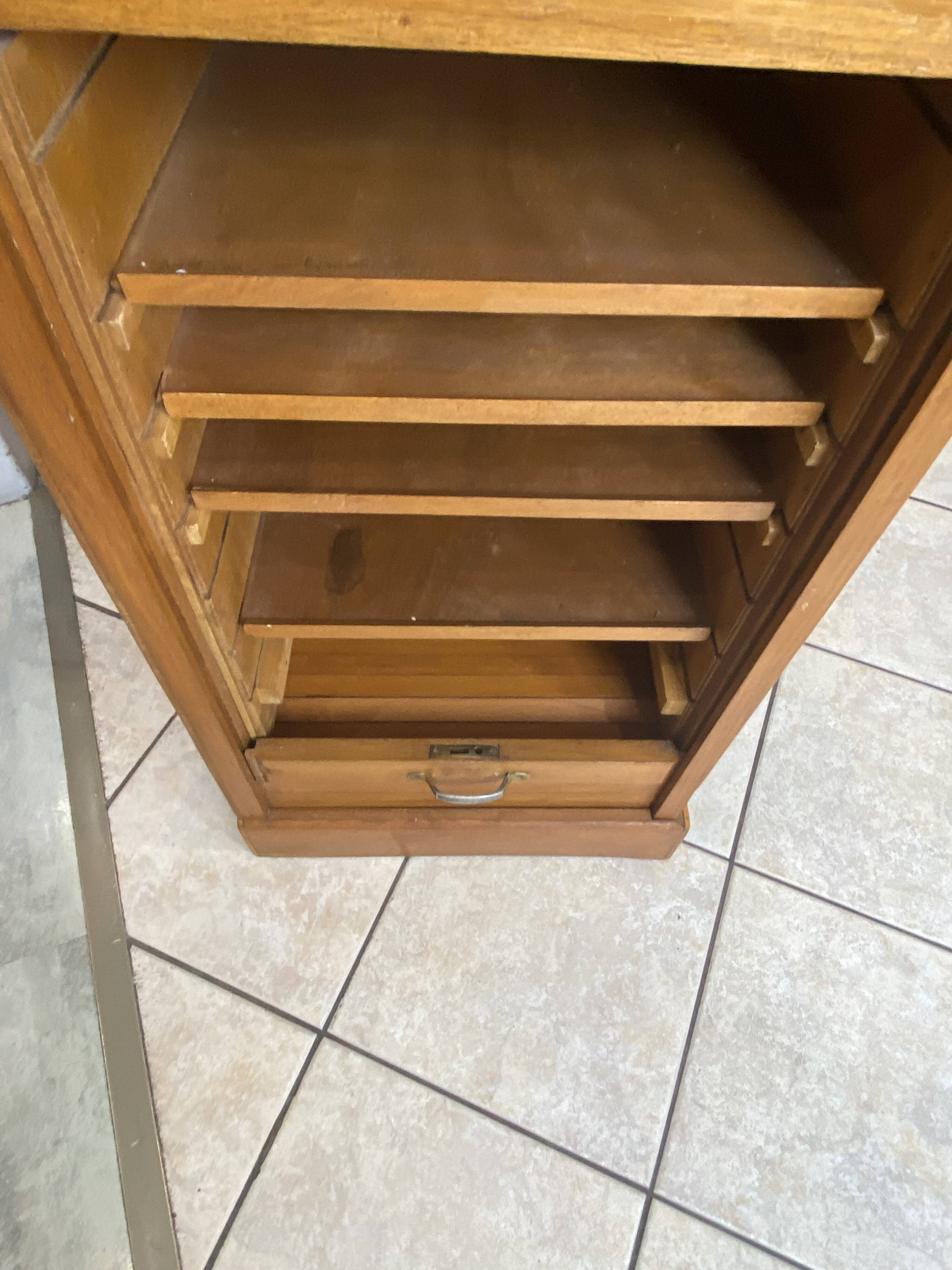 1950s oak office storage cabinet with curtains.