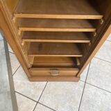 1950s oak office storage cabinet with curtains.