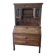 Large secretary with a drop-down front in carved oak, neo-Renaissance style.