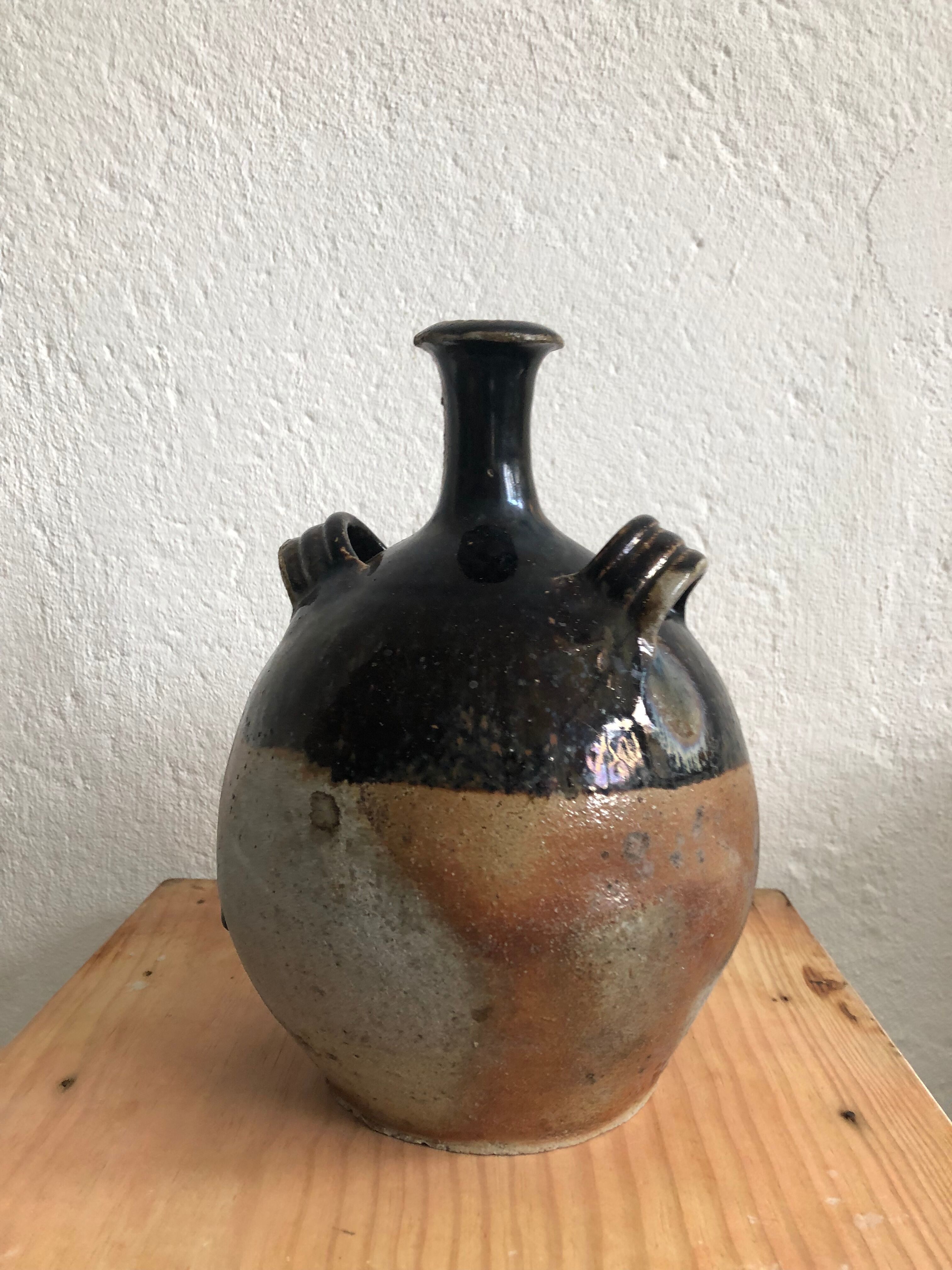 Old glazed terracotta jar