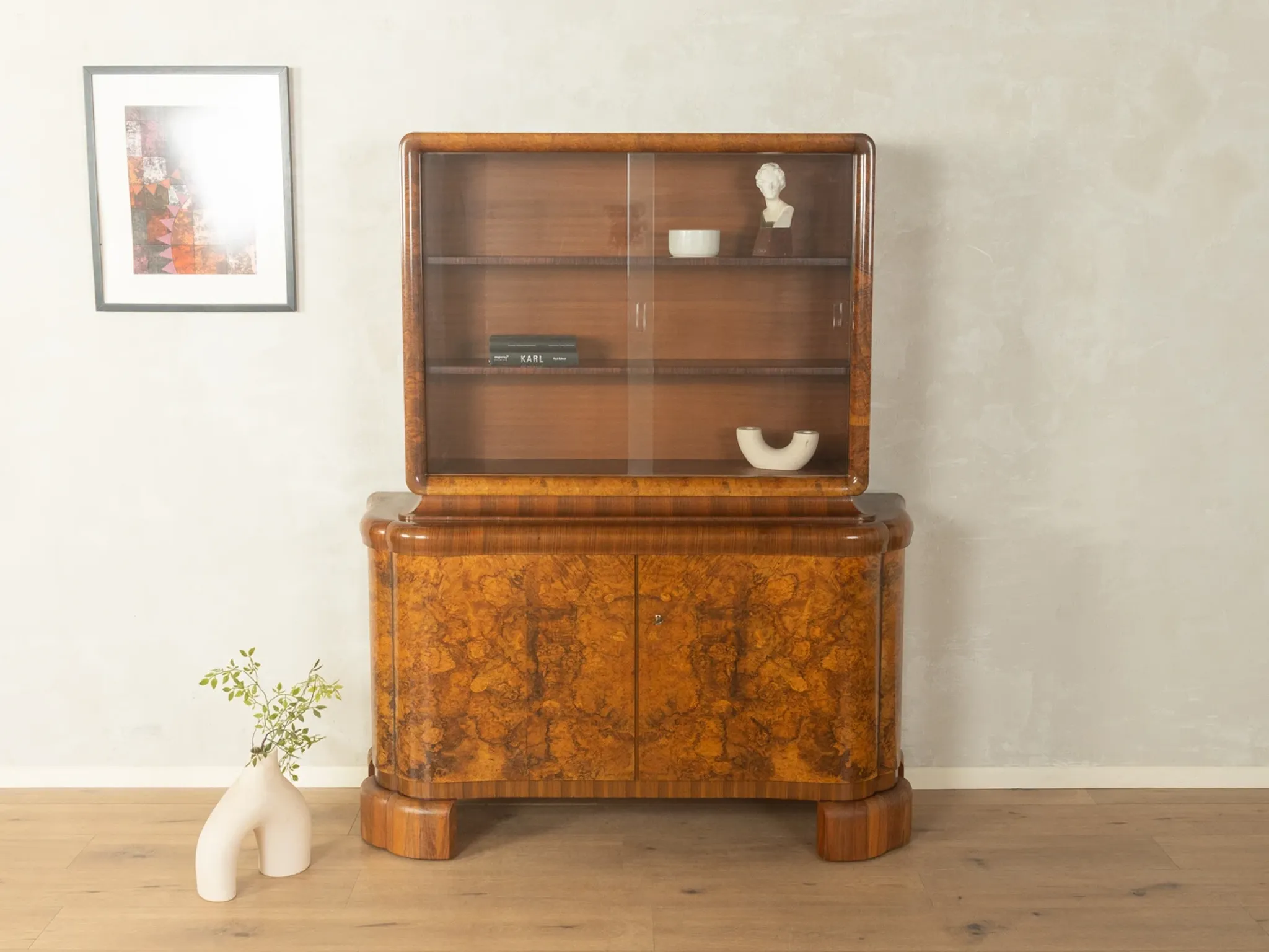 Classic two-piece Art Deco display cabinet from the 1930s with striking burl wood veneer
