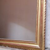 Golden mirror with pediment XIXth
