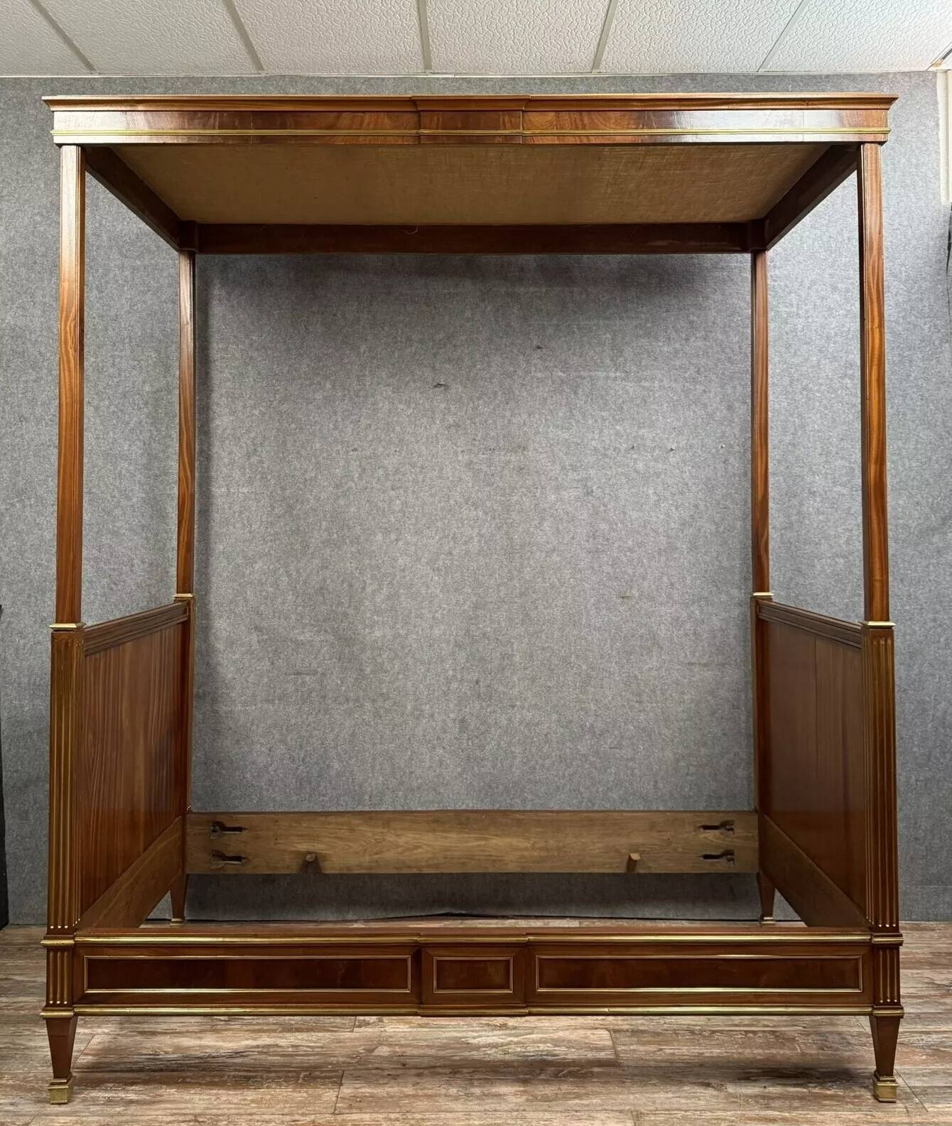 Parisian Louis XVI style four-poster bed in mahogany and gilded bronze circa 1850