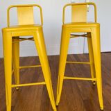 Pair of yellow Tolix high chairs