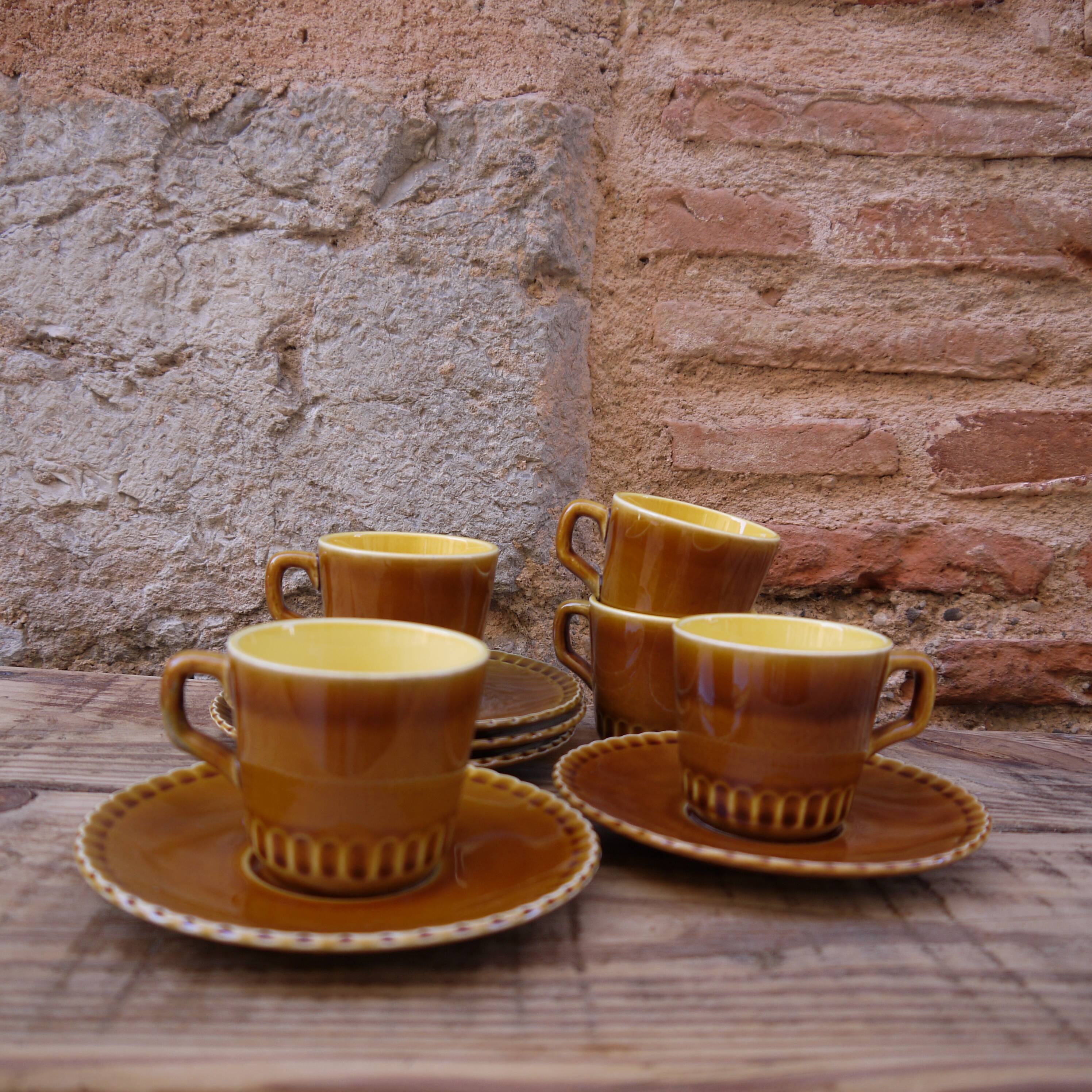 Lot of five cups and saucers Digoin