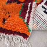 Handwoven Moroccan rug, natural wool, 250cm x 150cm, elegant decoration.