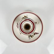 Hand-painted ceramic candlestick, flower pattern.