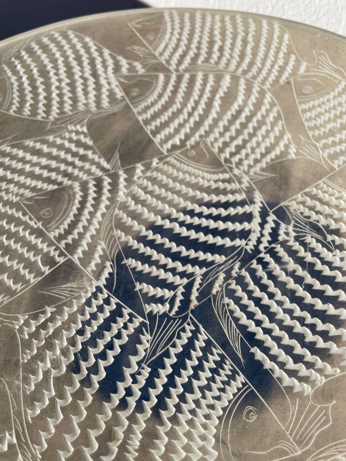 Ethnic handmade round fish dish