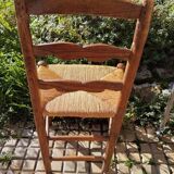 Old farm chair in wood and straw, Normandy