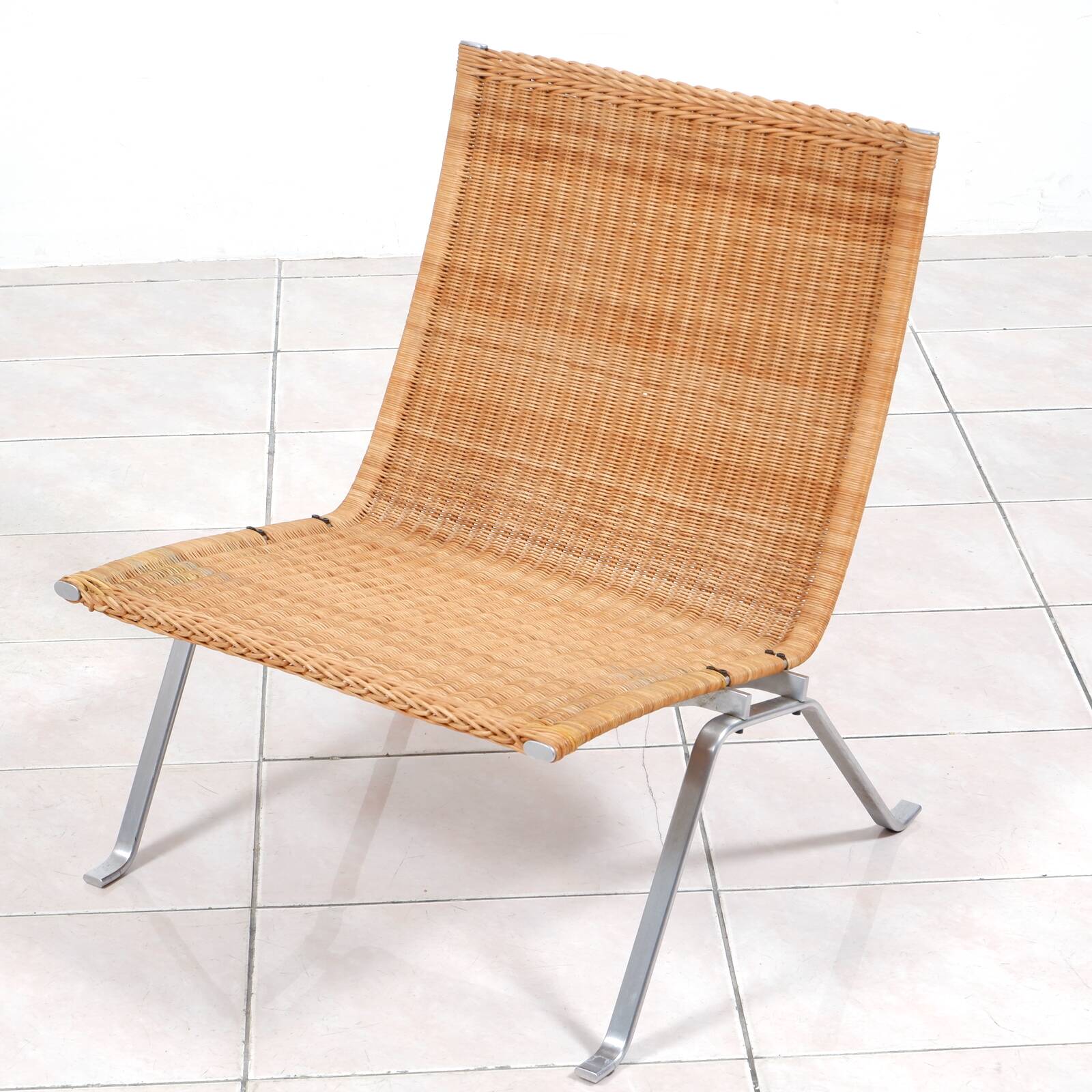 PK 22“ lounge chair in rattan by Poul Kjaerholm for E. Kold Christensen