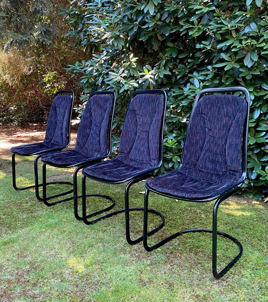 Set of four black highback dining chairs,  1970s