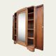 Art Deco wardrobe with bevelled mirror in solid raw walnut.