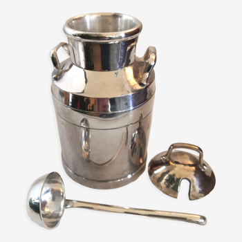 Old milk jug or sugar in silver metal