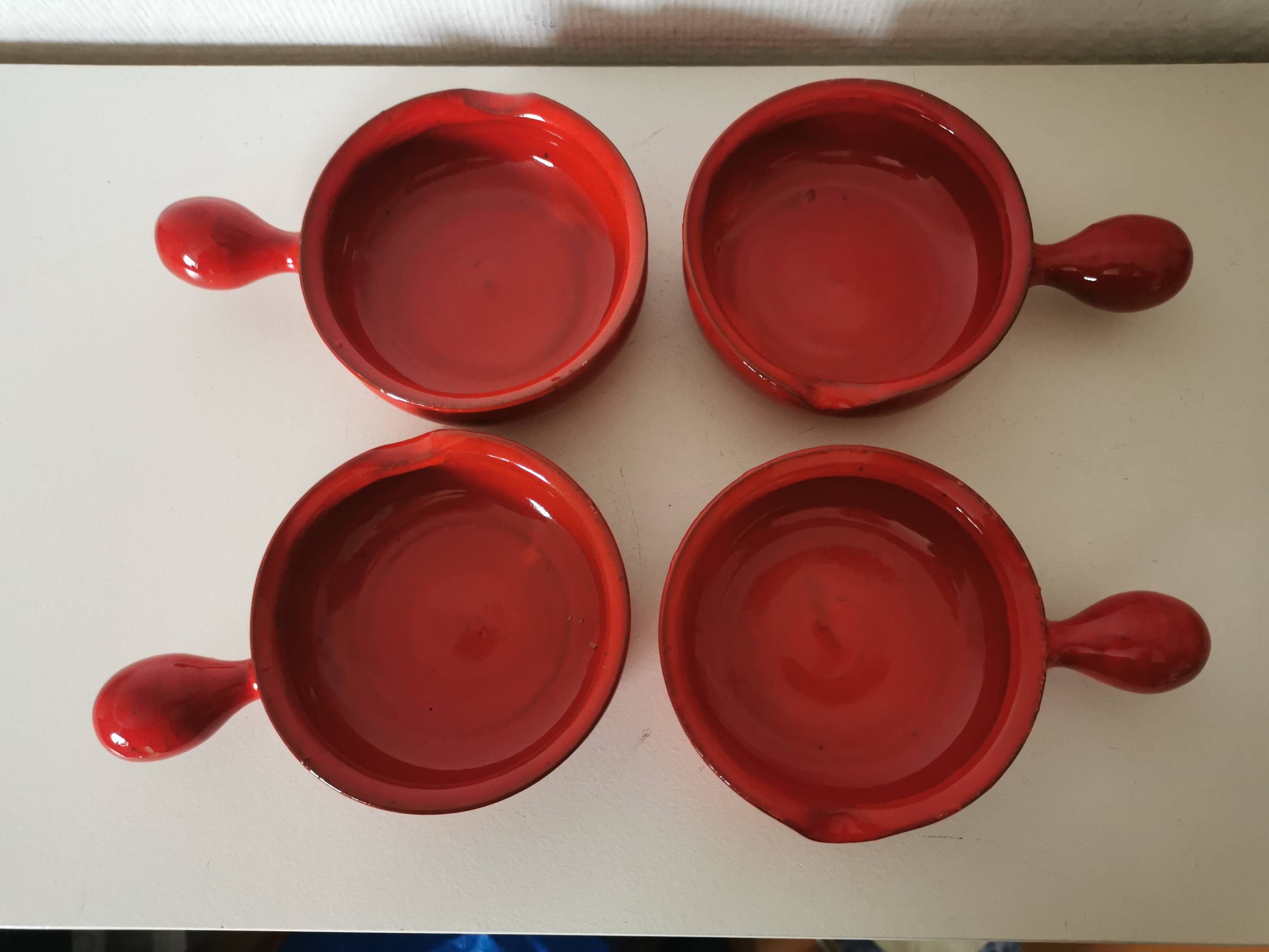 set of 4 red enamelled terracotta casseroles