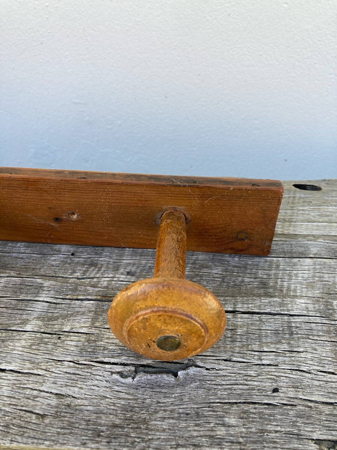 Old wooden wall coat rack