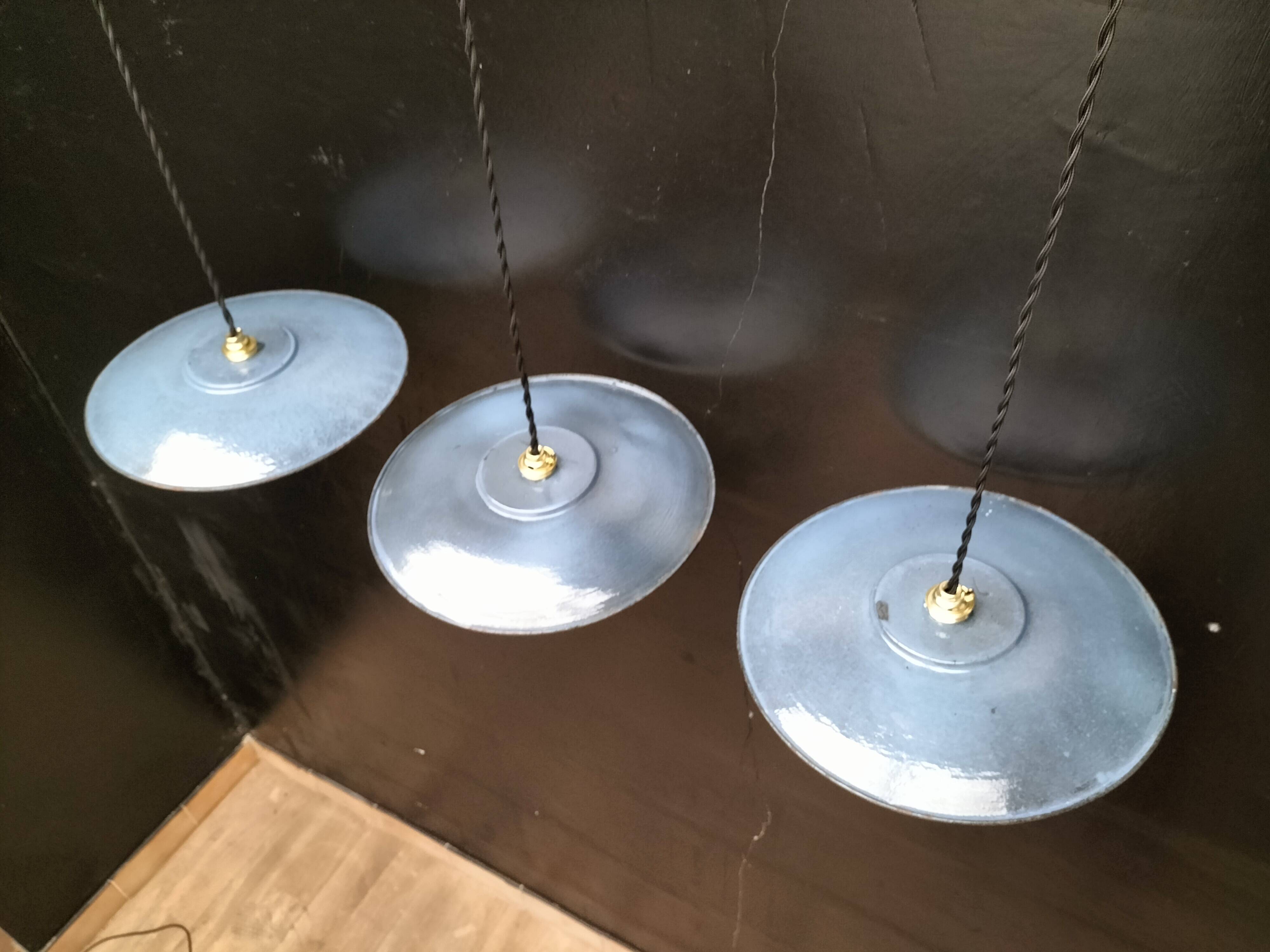 3 blue enameled sheet metal pendant lights
