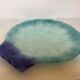 Blue glass paste pocket emptier
